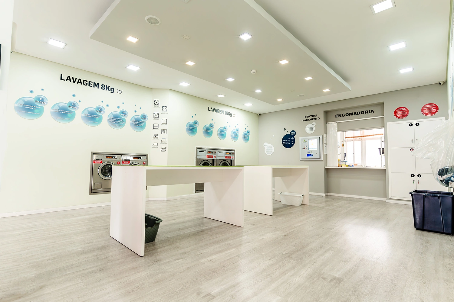 Área de lavagem e engomadoria profissional com máquinas Miele - serviços completos para todas as suas necessidades de tratamento têxtil